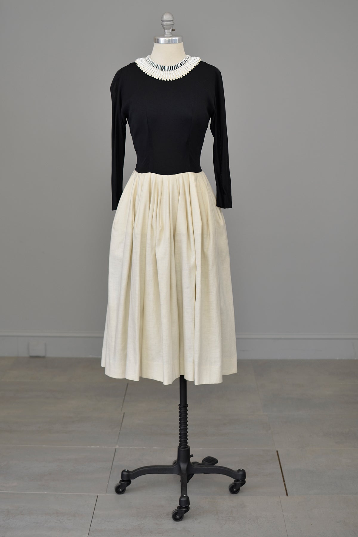 Early 1950s Black and Cream Egyptian Beaded Neckline Cocktail Party Dress | Jersey Bodice, Full Skirt | Bonwit Teller | XXS