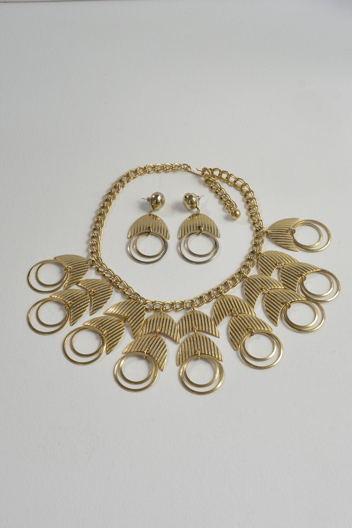 Vintage 1970s Gold Tone Crescent Moon and Open Rings Necklace and Earrings